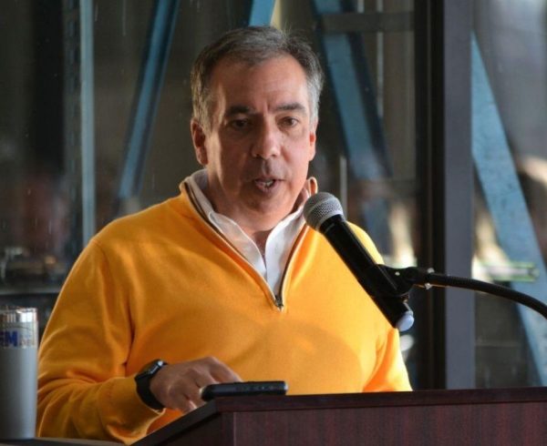 Image of Nashville Predators CEO Sean Henry speaking at an event.